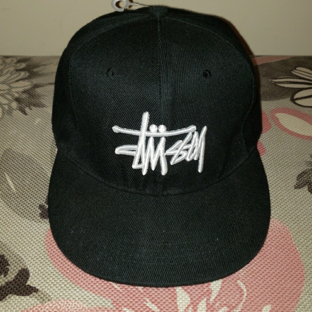 Black hat with white writing